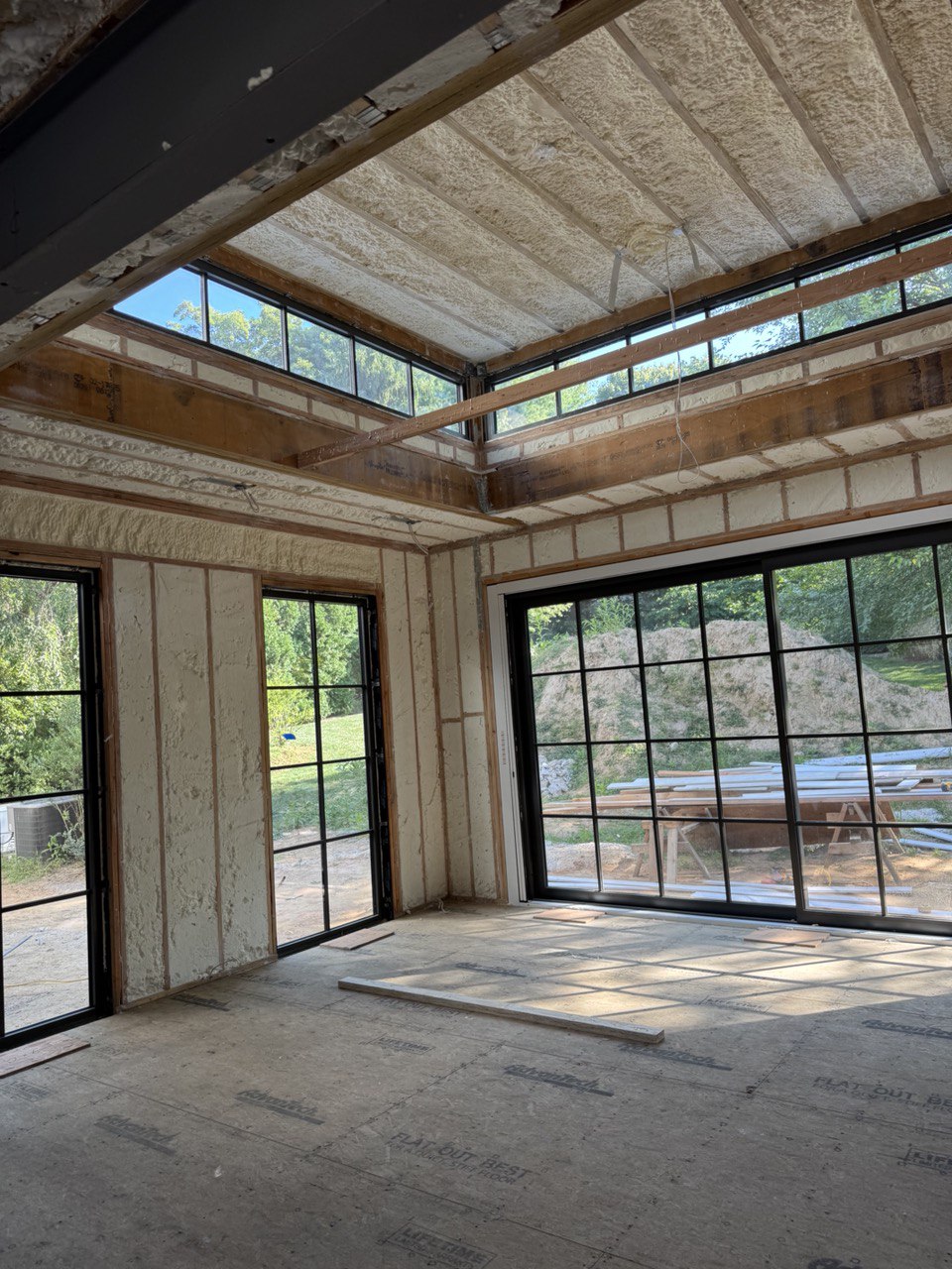 After spray foam insulation - fully insulated walls and ceiling